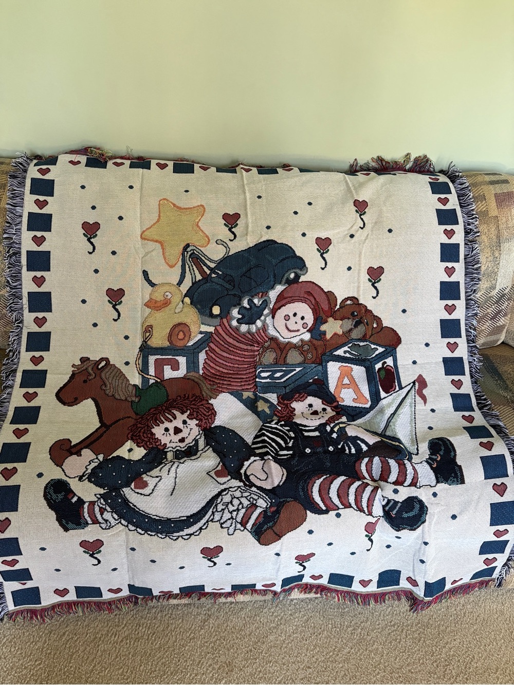 Cream Toy Patch Fringe Throw Blanket with Blue & Red Accents